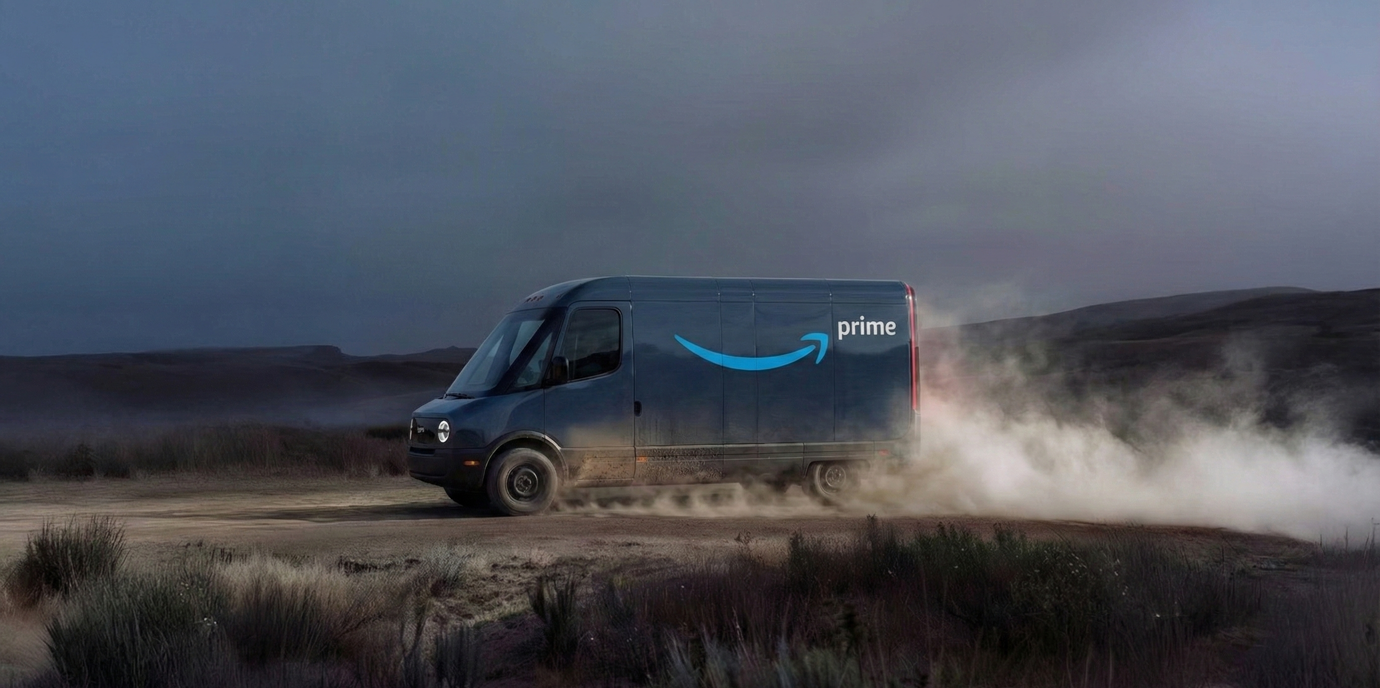 Amazon Prime delivery truck on a desert road with a stormy sky.